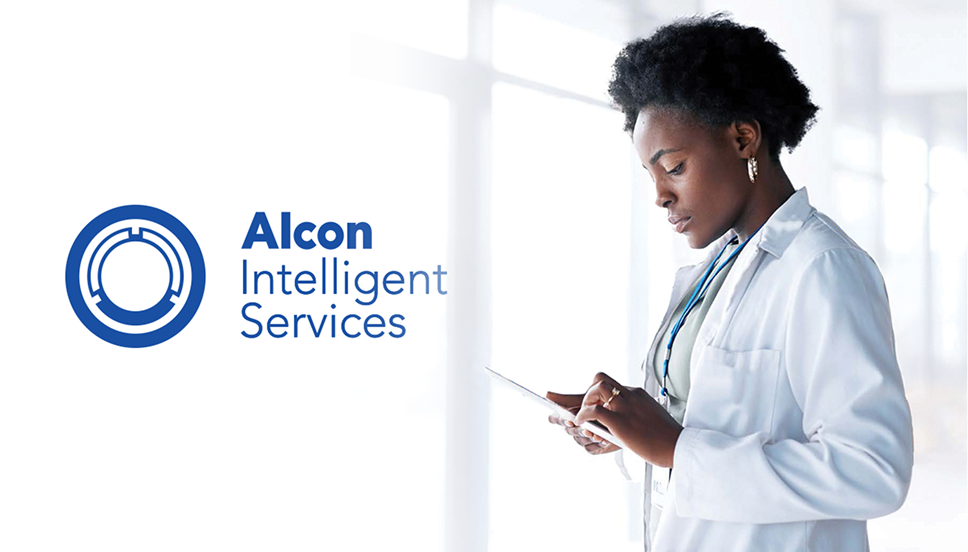 Female doctor using a digital tablet, with the Alcon Intelligent Services logo displayed on the left side of the image