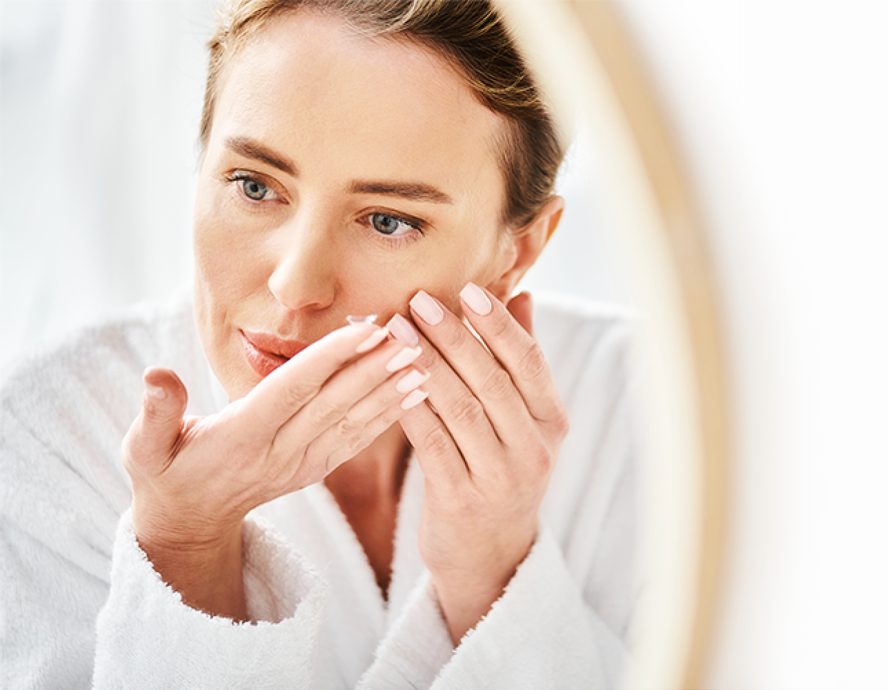 Woman putting in a contact lens
