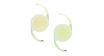 Two Alcon Clareon intraocular lenses (IOLs) shown side by side, one with concentric rings for multifocal vision and one with a smooth surface for monofocal correction.