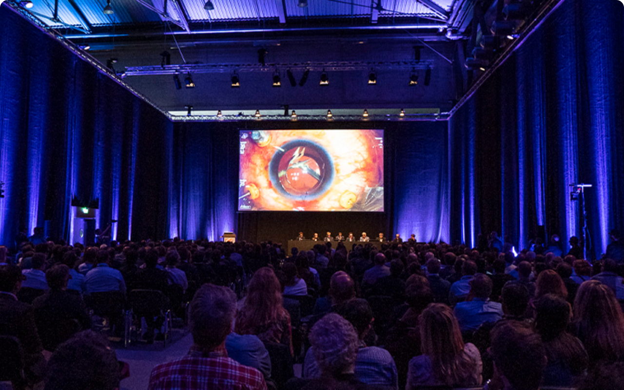 A group of people during a presentation